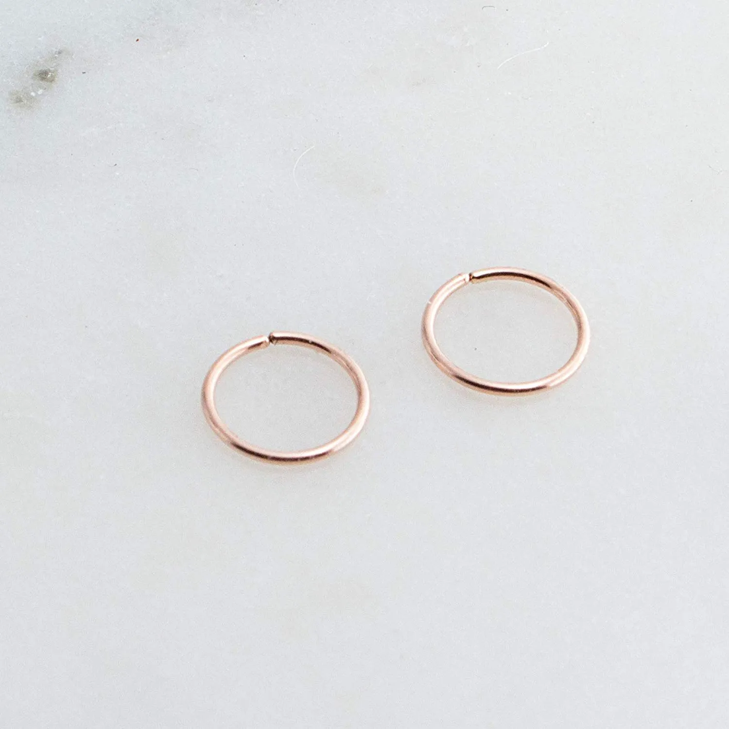 Gold, Sterling Silver Tiny Thin Hoop Earrings for Women Cartilage Nose Septum Helix Tragus Rings Multiple Piercing Jewelry, Hypoallergenic (7mm | 24 GA, 14K Rose Gold Filled)